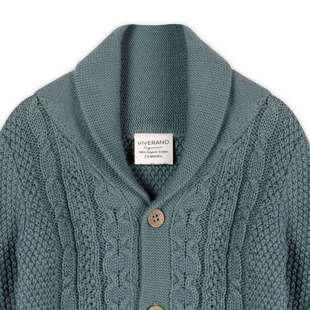 
                      
                        Top flatlay view of Viverano Organic Cotton Baby Cardigan showing shawl collar and soft knit texture
                      
                    