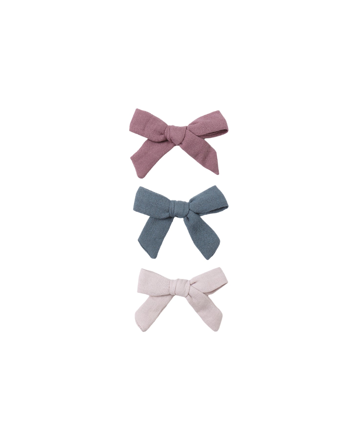 Front view of the Mulberry, Ocean, and Lilac organic cotton bow clips, showcasing their soft fabric and vibrant colors.