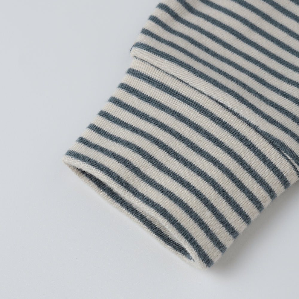 
                      
                        Close-up of the Ocean Micro Stripe Drawstring Pant, focusing on the fabric texture and stripe detail.
                      
                    