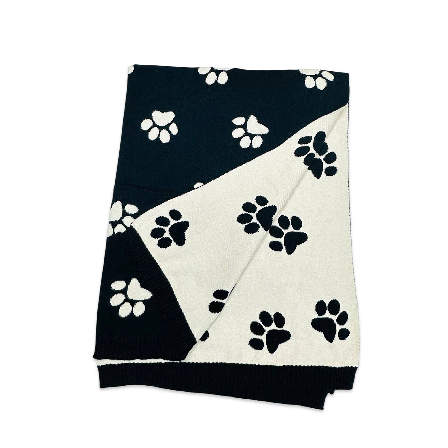 Folded Viverano Organic Cotton Dog Paw Blanket showing soft, reversible jacquard knit design