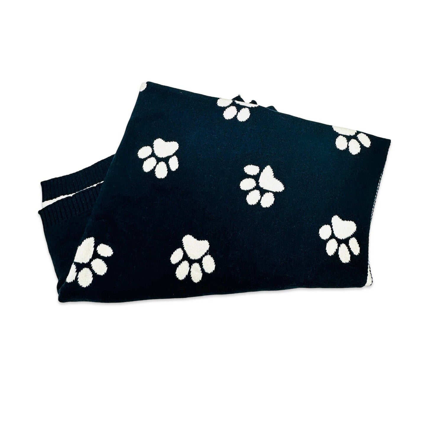 Close-up of dog paw jacquard knit pattern on soft organic cotton baby blanket by Viverano