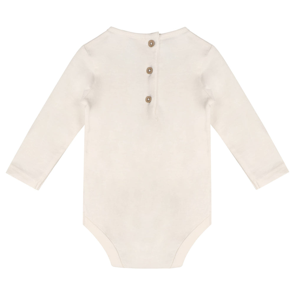 
                      
                        Back flatlay of organic cotton long-sleeve baby bodysuit included in Viverano Puppy Overall Set showing button detail
                      
                    