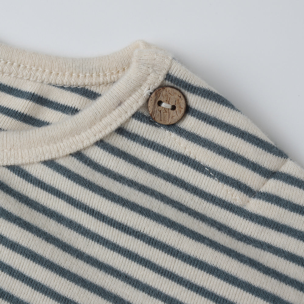 Close-up of fabric and micro stripe detail on the Organic Long Sleeve Tee by Quincy Mae.