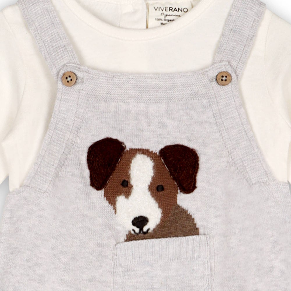 
                      
                        Close-up of 3D puppy embroidery peeking from front pocket on Viverano organic baby overall
                      
                    