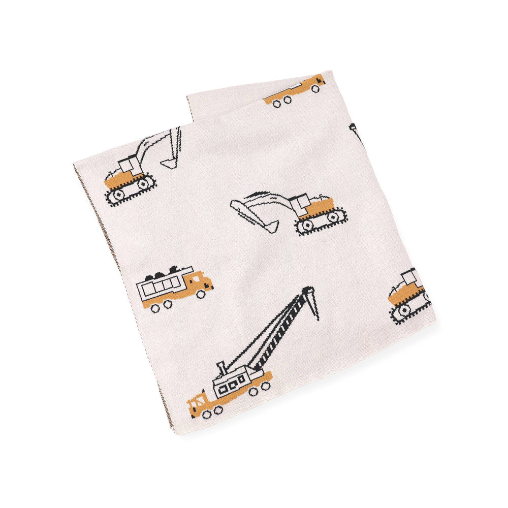 
                      
                        Folded Viverano Organic Cotton Baby Blanket with trucks design, showing soft and breathable knit texture
                      
                    