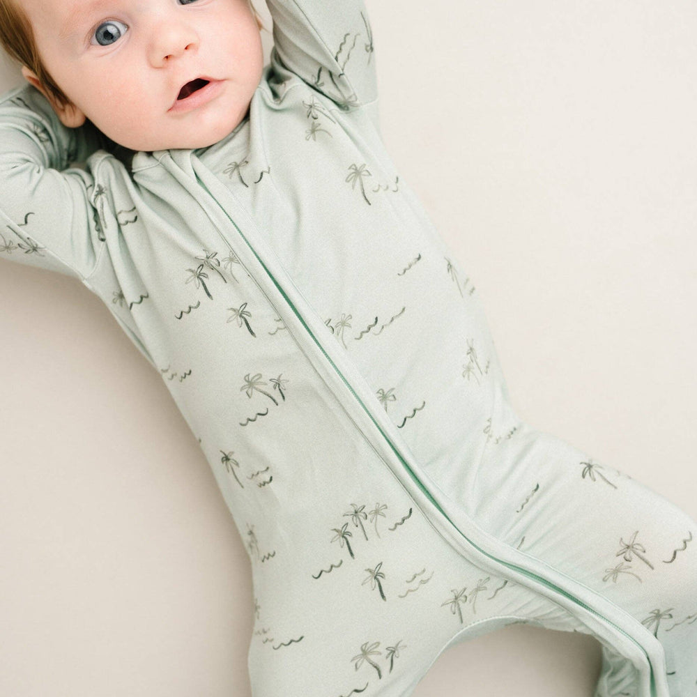 Detailed view of Palm Breeze Bamboo Sleeper zipper and neckline, highlighting quality stitching and smooth finish.