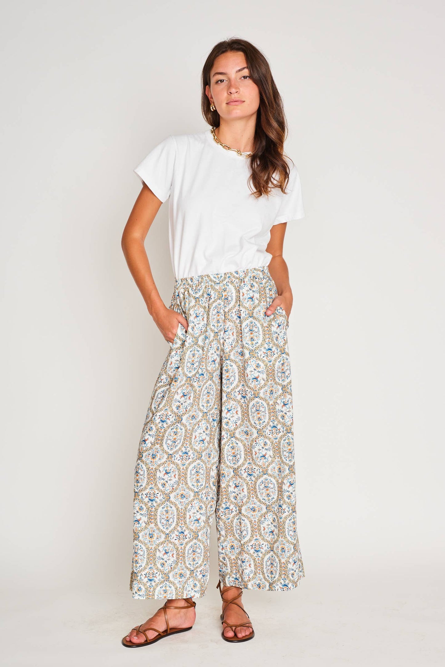 Front view of model wearing Paloma Wide Leg Pant in Santorini Mosaic print with a simple top, showing relaxed, flattering silhouette