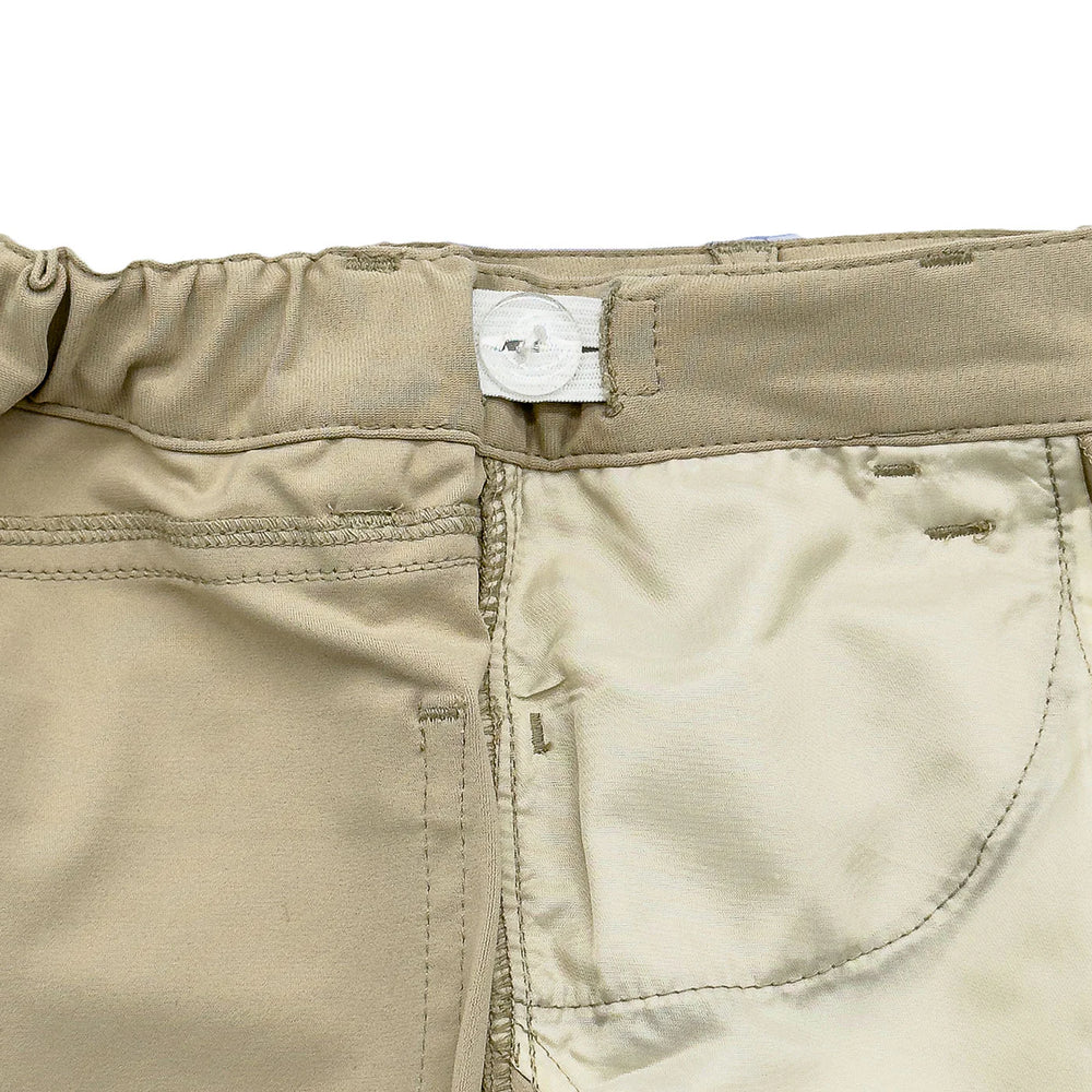 
                      
                        Close-up of built-in growth tabs on Par Performance Pants, showing adjustable waist for long-lasting fit and comfort.
                      
                    