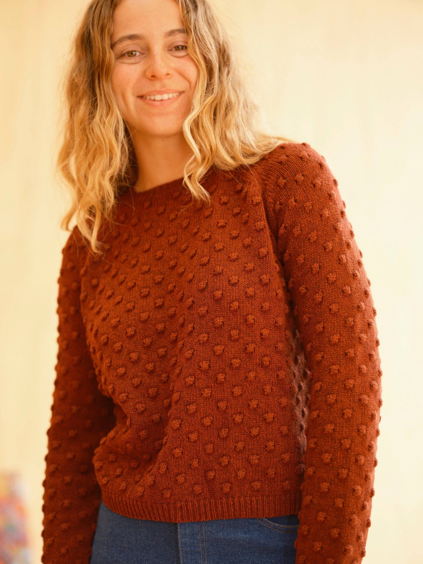 Pearl Sweater front view showing vintage-inspired popcorn texture and raglan sleeves