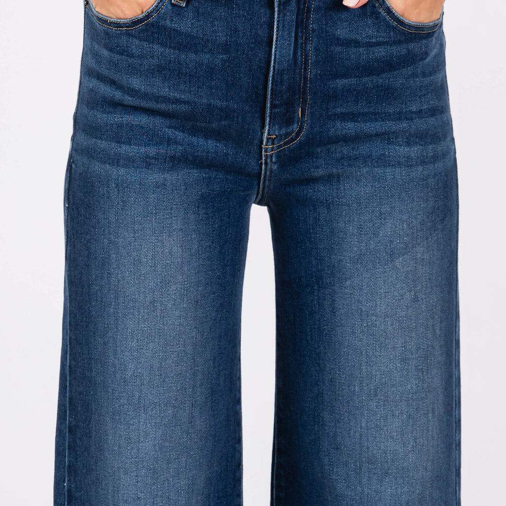 
                      
                        Detailed close-up of Pipa High Rise Superwide Jeans front fly with hands in pockets, showing denim texture, stitching, and waistband structure.
                      
                    