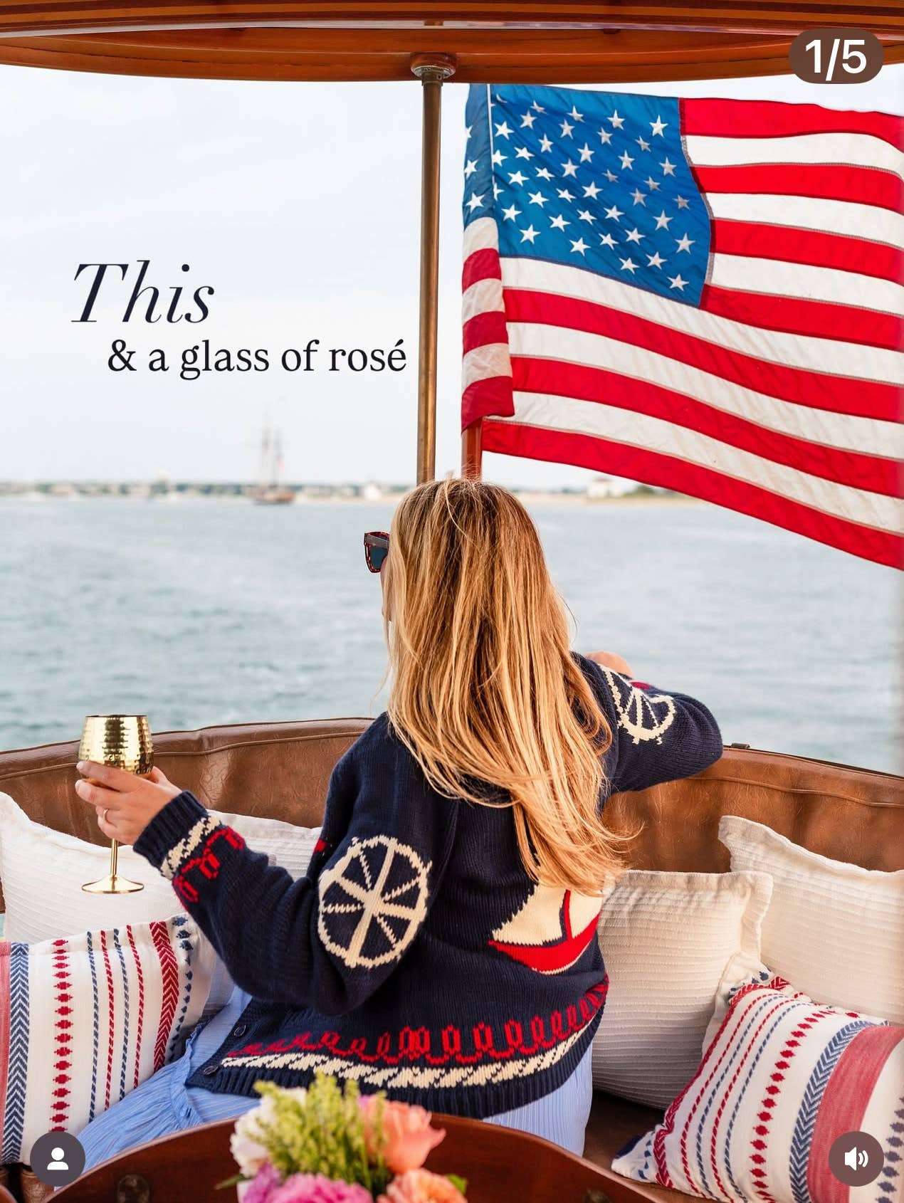 Close-up of sailboat motif and knit texture on varsity duffle cardigan