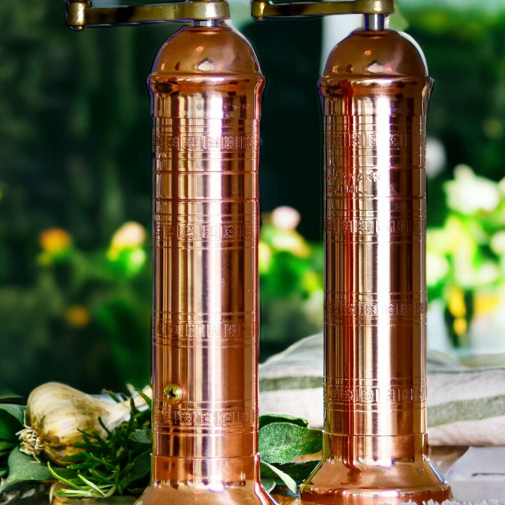 
                      
                        A matching salt and pepper mill set crafted from copper by Alexander Handmade Mills, showcasing timeless elegance and superior functionality.
                      
                    