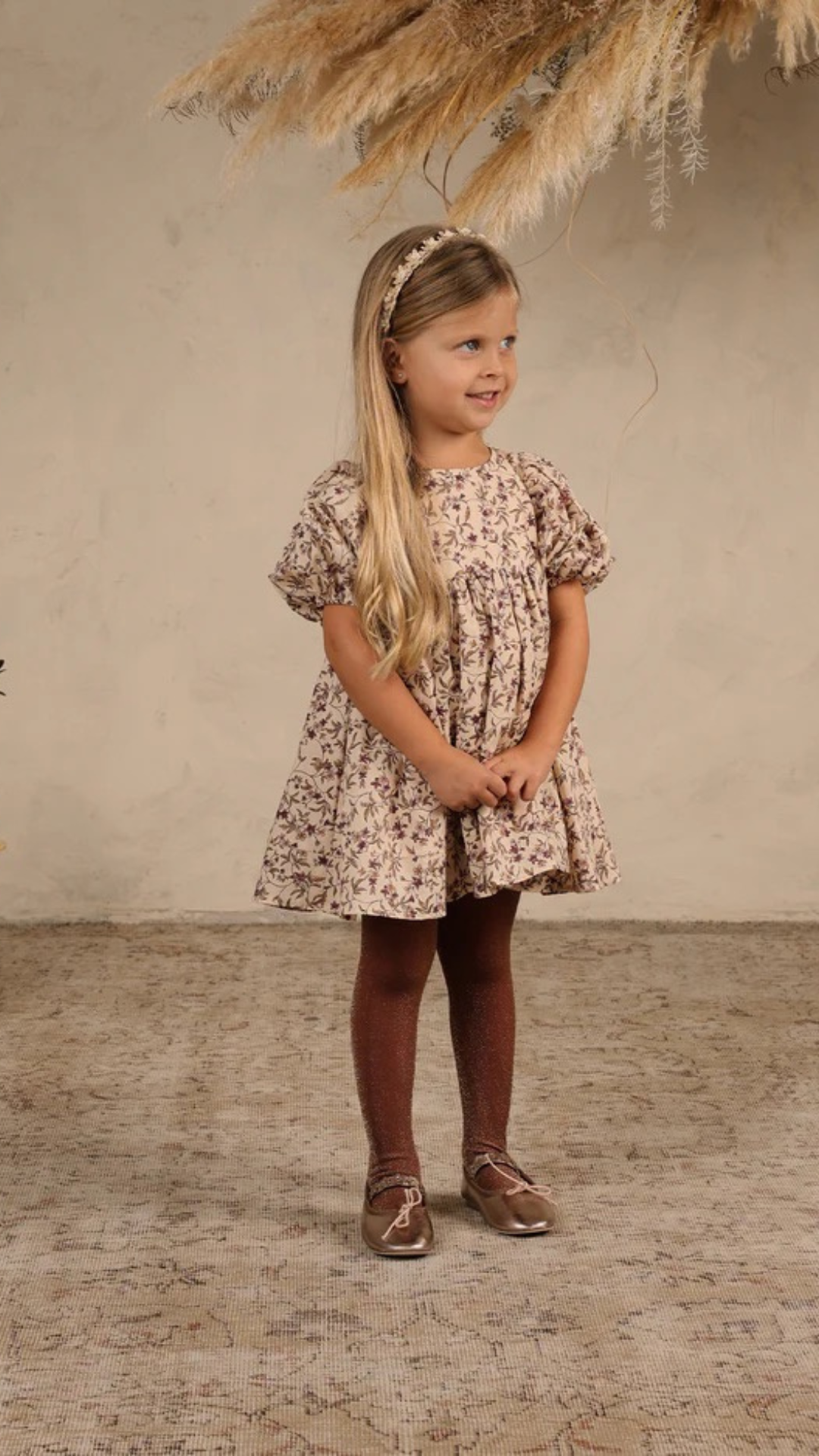 Toddler wearing Noralee Shimmer Tights in Fig, styled with a cozy autumn outfit for a special occasion.