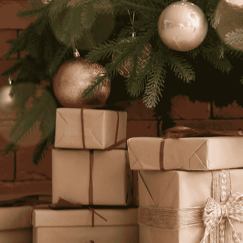 Signature Package: 6–15 curated holiday gifts from Grace & Haven and local artisans with premium wrapping