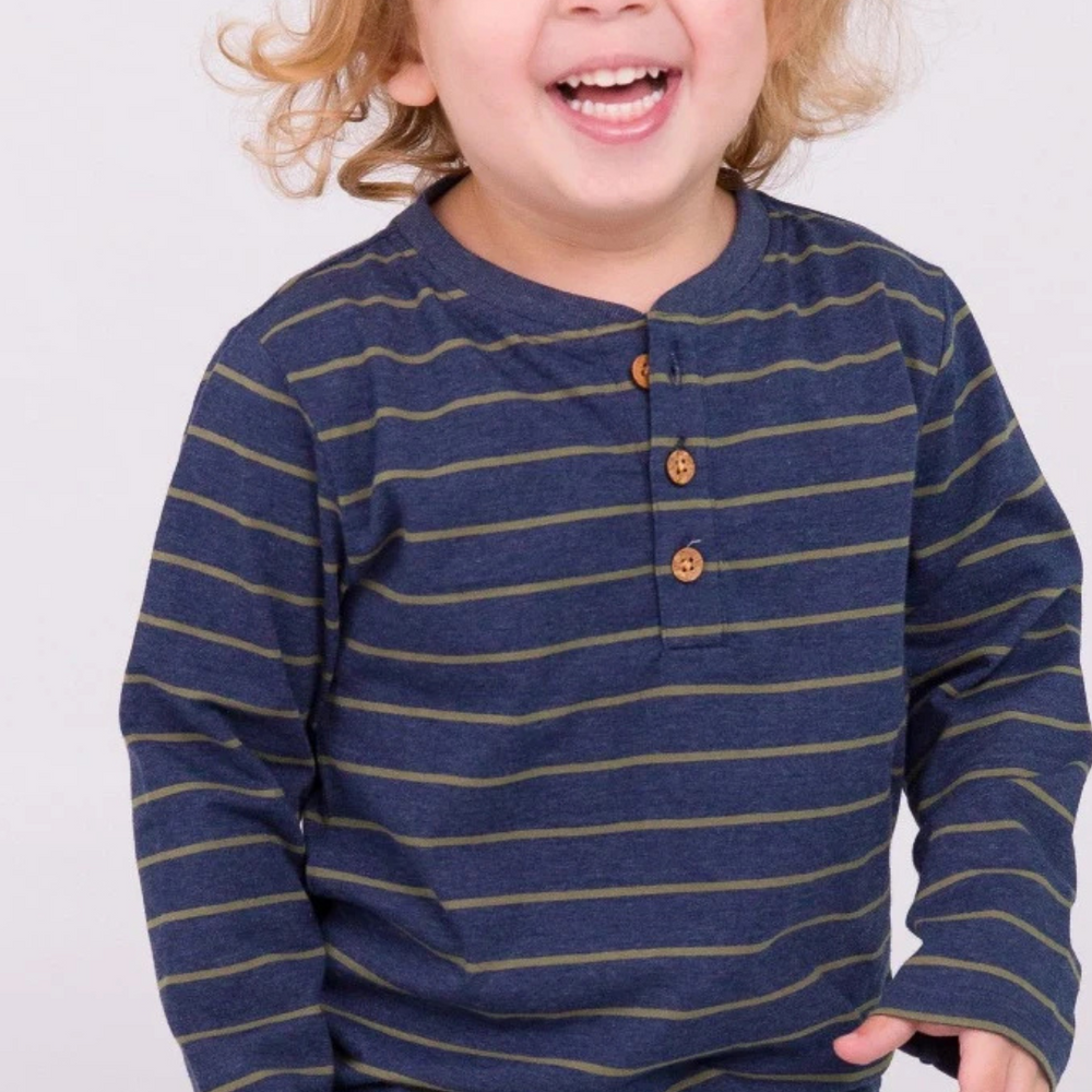 
                      
                        Happy little boy wearing the Boys Dusty Olive Stripe Knit Long Sleeve Henley Tee, showcasing its stylish design in a bright studio.
                      
                    