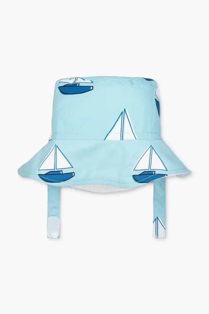 Flat lay of Set Sail kids sun hat showing nautical-inspired pattern and bucket-style brim