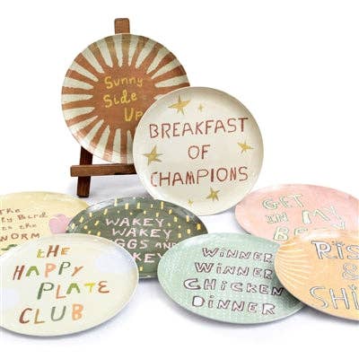 Breakfast Club Melamine Plates by Sugarboo with sayings like "Breakfast of Champions", "Winner Winner Chicken Dinner", and "The Happy Plate Club"
