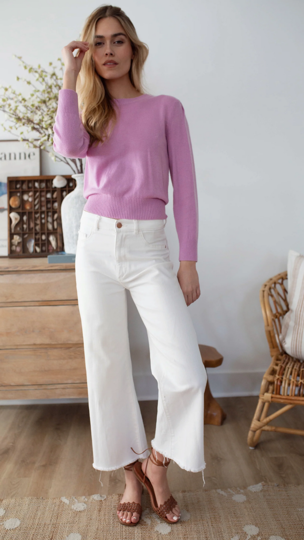 Close-up of the Marea Cashmere Sweater, highlighting the delicate puff sleeves and fine gauge knit fabric.