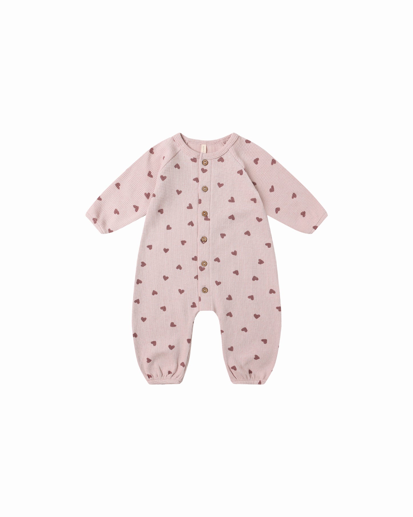 Front view of the Hearts Waffle Long Sleeve Jumpsuit by Quincy Mae, soft organic cotton for babies.