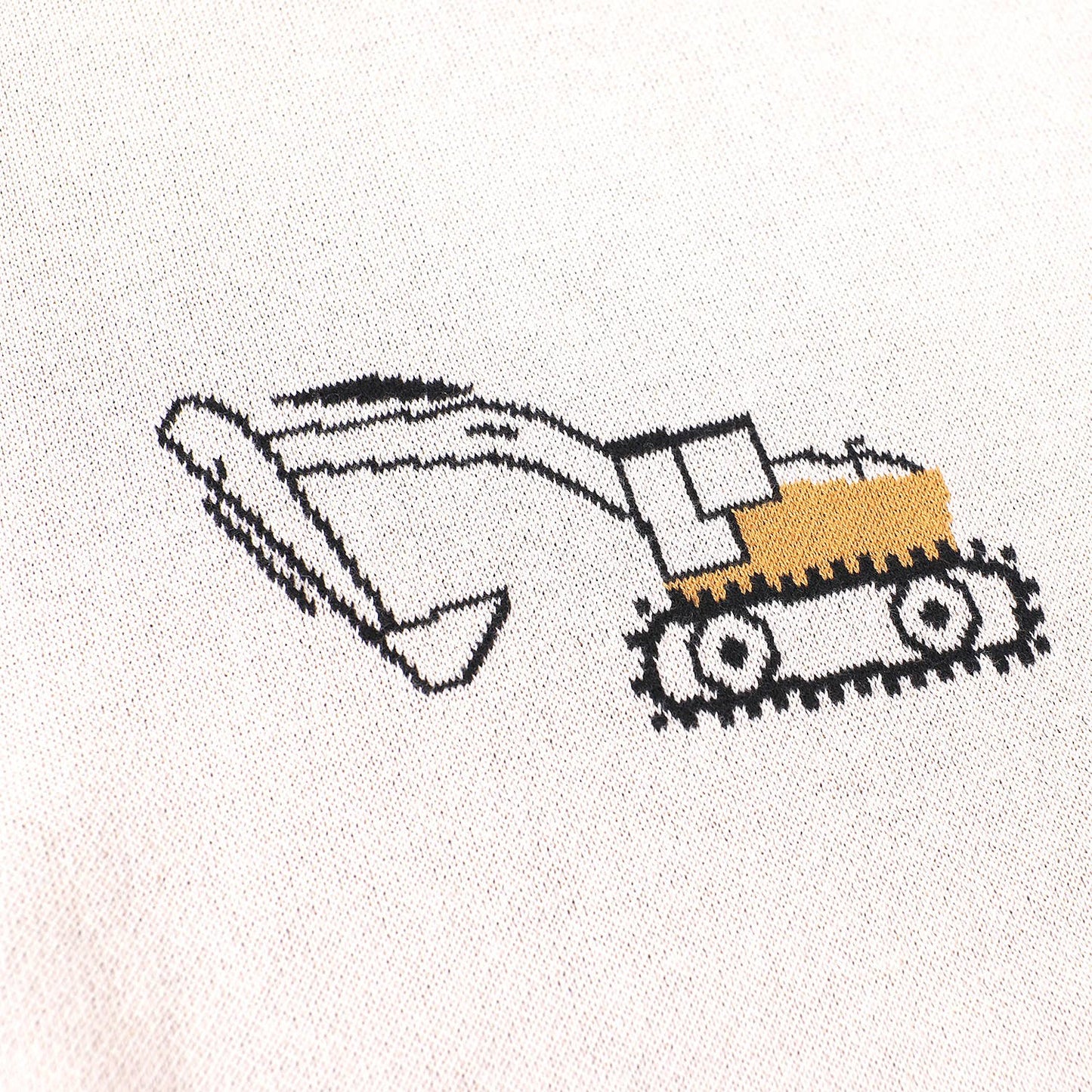 Close-up of detailed excavator jacquard knit design on Viverano Organic Cotton Baby Blanket